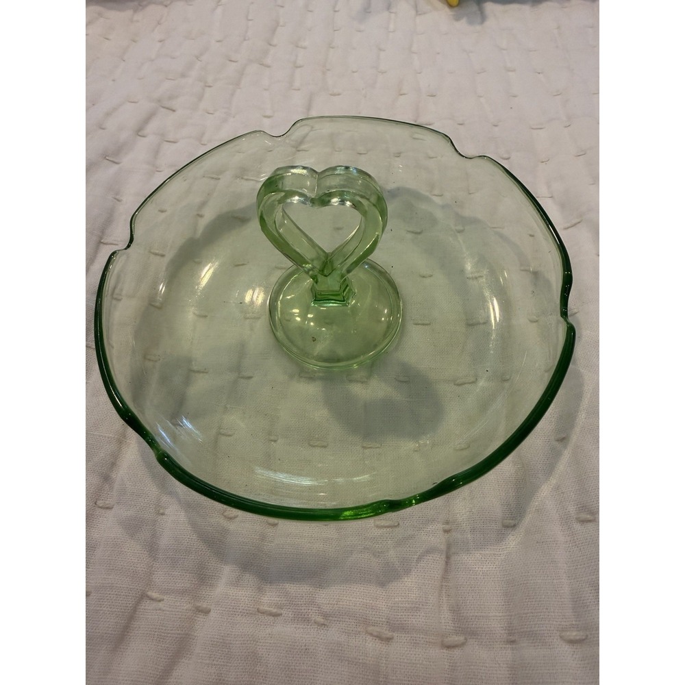 This is a vintage green uranium depression glass Ash Tray Or Trinket Dish